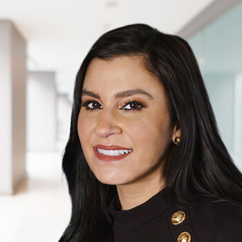 Dr Anita Bhanvani headshot with woman facing forward